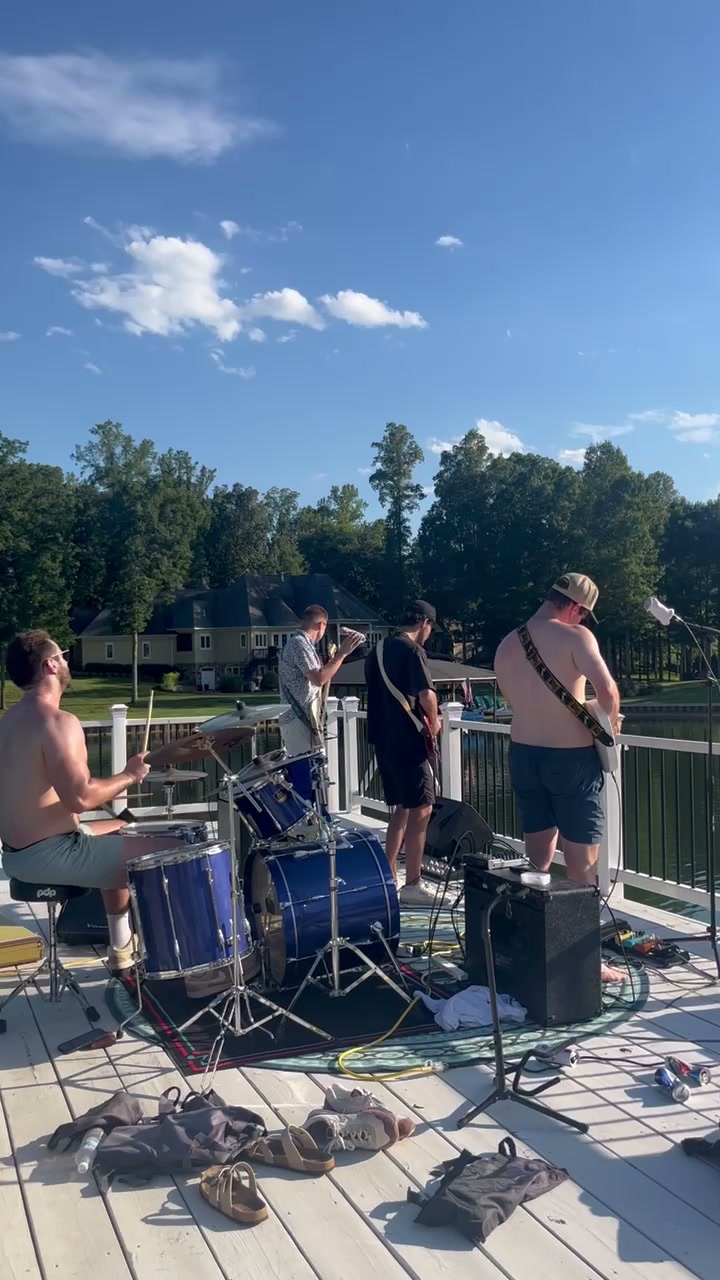 Wheat for Sheep performing on a dock at Lake Anna